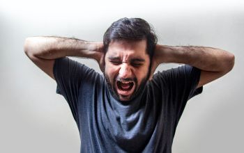 Frustrated Young Man Screaming in Fear - Usman Yousaf / Unsplash.com